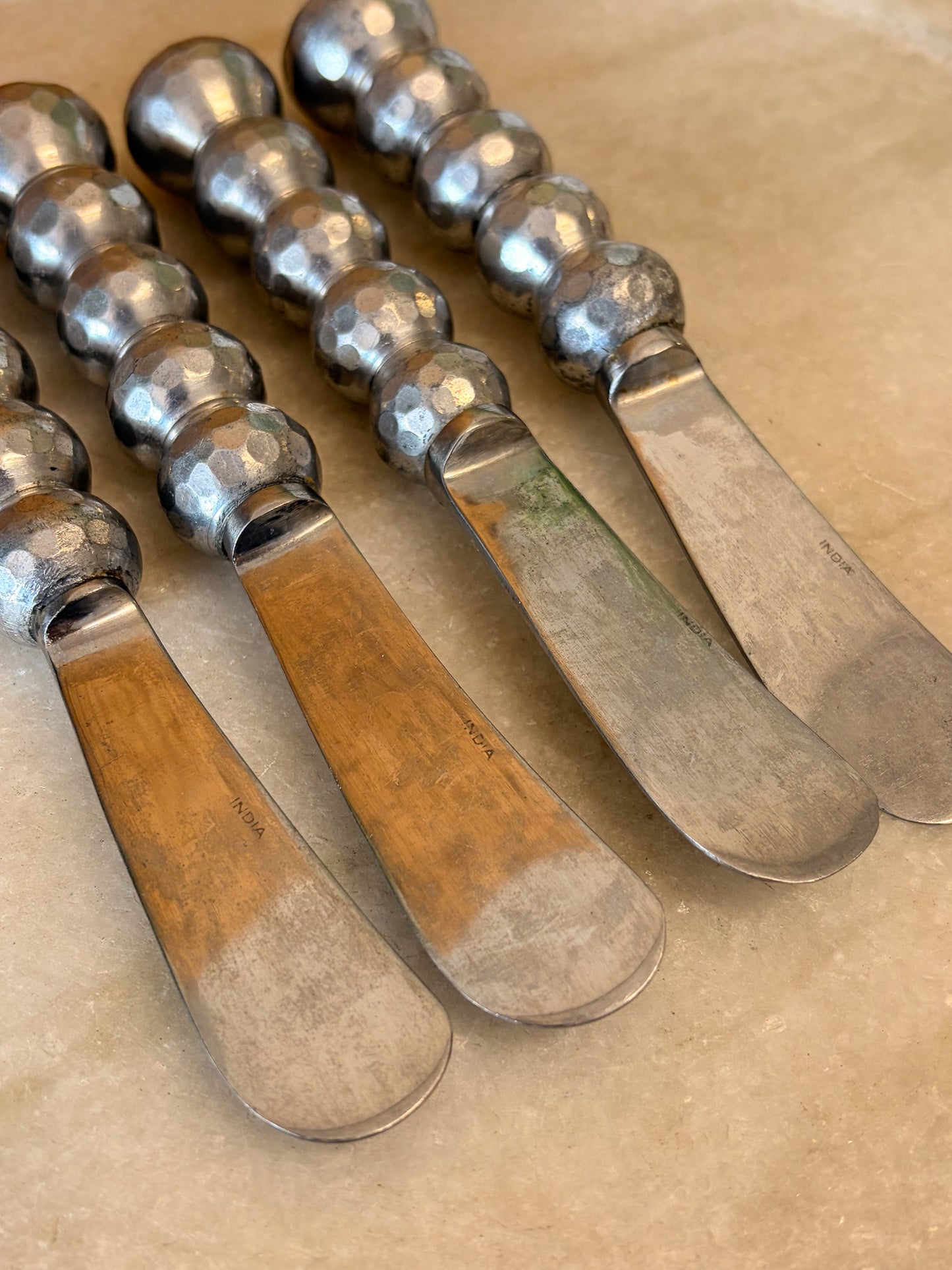 Set of Four Hammered Metal Spreaders